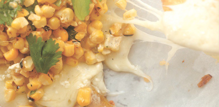 Plantain Chip Nachoes with grilled corn and crema