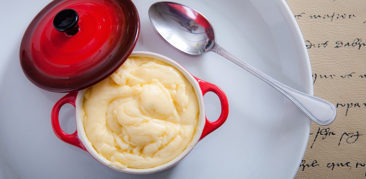 Aligot cheese dip in a le creuset pot