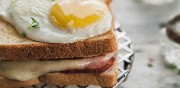 croque madam sandwich on wire cooling rack