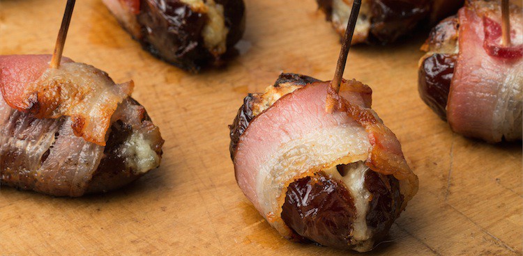 blue cheese and marcona almond stuffed dates, wrapped in bacon and broiled