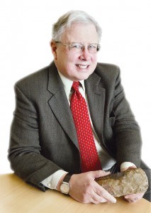 Peter Bogucki, holding a chunk of neolithic stone, believes that Neolithic potsherds may be remnants of the world’s first cheesemaking tools