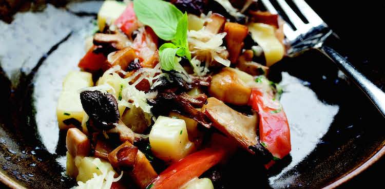 diced potatoes, mushrooms, and vegetables are brought together by Svecia cheese sauce