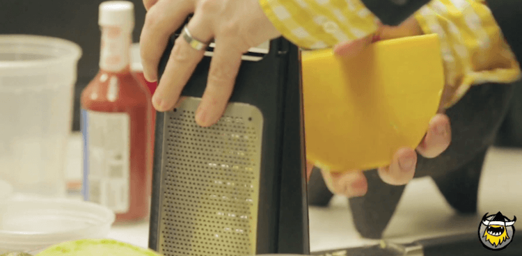 block of cheese and grater