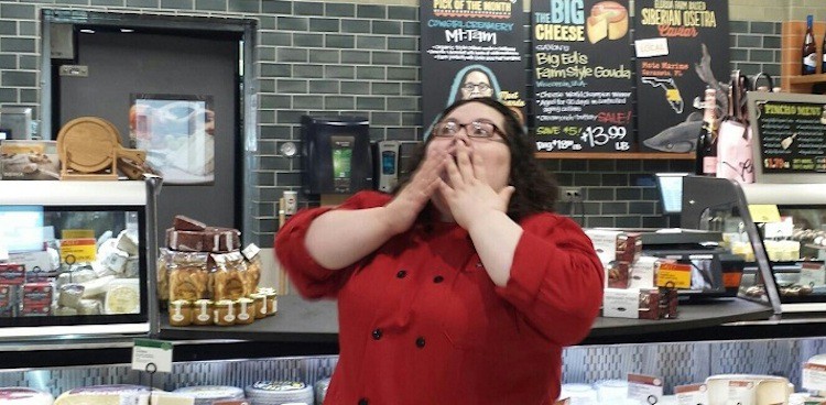 Cheesemonger Amanda Puckett gasping at the huge and overwhelming selection of cheeses at her shop