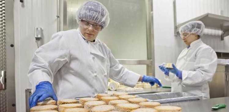 Wegmans workers sort cheese