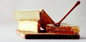 Culture's summer 2014 centerfold cheese offering: Murray's Cavemaster Reserve Fromage à Trois and Red Bee Honeycomb