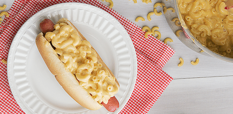 Hot dog topped with mac and cheese