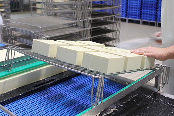 Curdless blocks of pre-cheese at Fromagerie Guilloteau