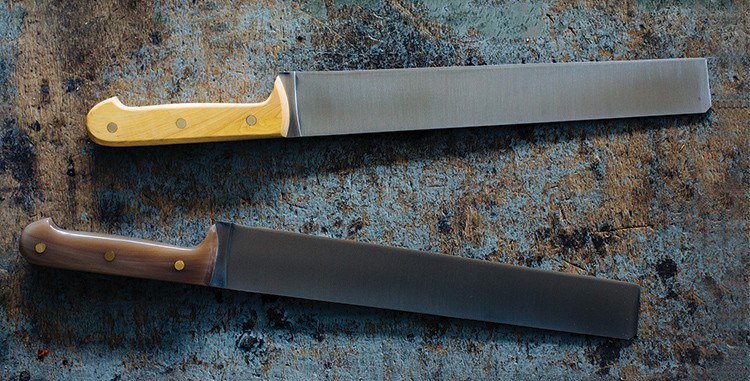 A finished hard-cheese knife with a boxwood handle, top, and a finished hard-cheese knife with a horn handle, bottom.