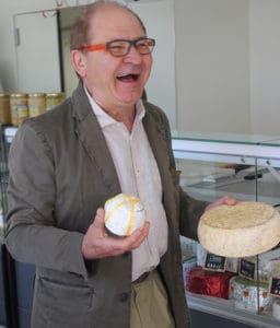 Managing director Francis Bouyssou shows off some of Garmy's original cheeses in the dairy's on-site shop