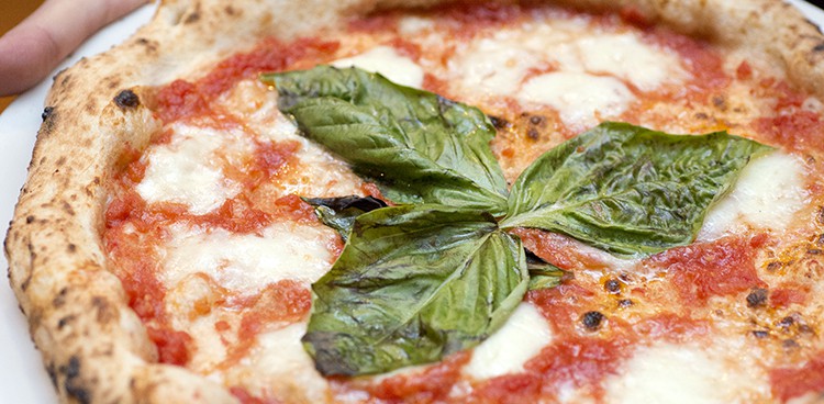 Basil-topped pizza from Don Antonio by Starita