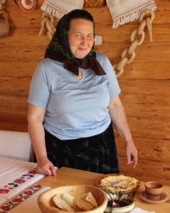 Irina Bozai serves breakfast in Maramureş. Photo Credit: Molly McDonough.