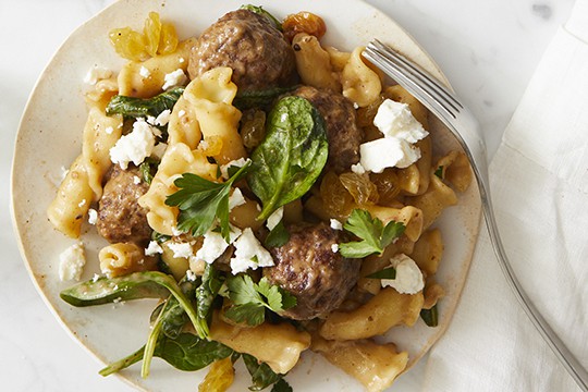 campanelle with mini lamb meatballs, greens, and gravy. photograph by Evi Abeler
