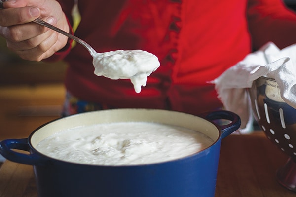 step 4: transfer yogurt from pot into colander