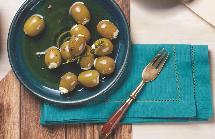 olives stuffed with fresh goat cheese, manchego, and herbs