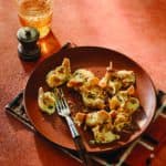 Pasta in a caramelized onion cheese sauce with breadcrumbs on top.