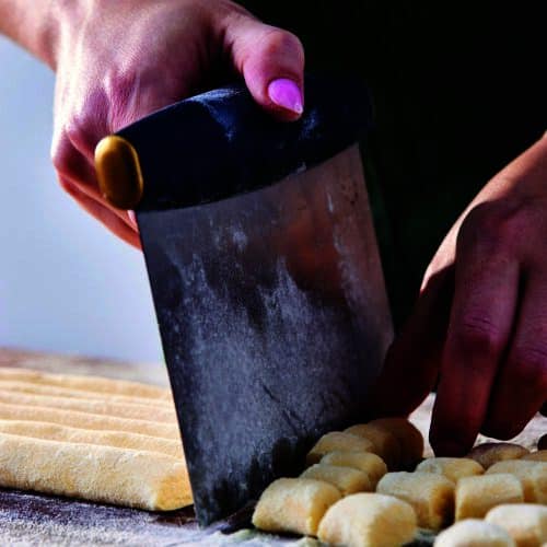 Gnocchi being shaped one by one.